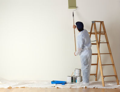 Painting man-painting-wall-with-ladders600x600